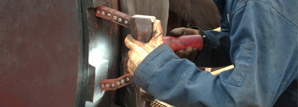 Technician Performing Magnetic Particle Testing on a Client Structure